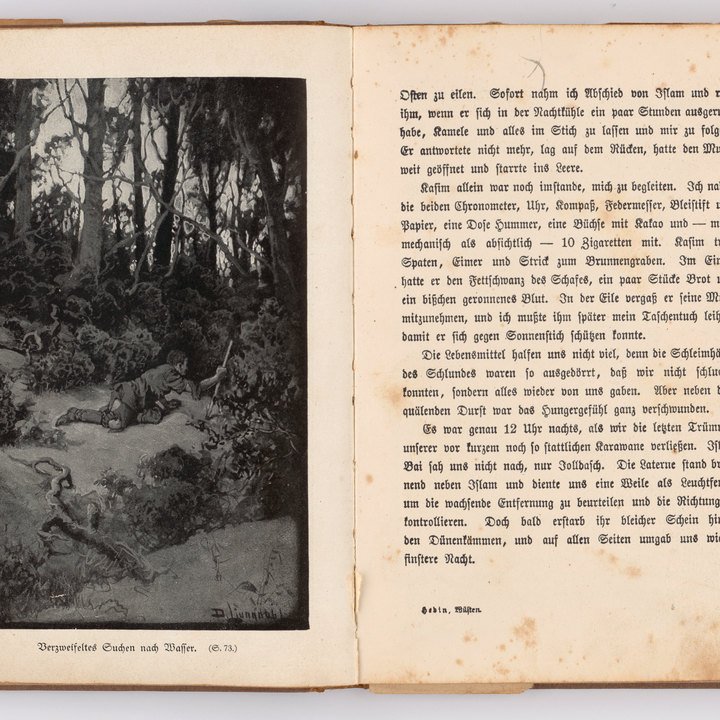 Aufgeschlagenes historisches Buch mit Bildtafel und Textseite